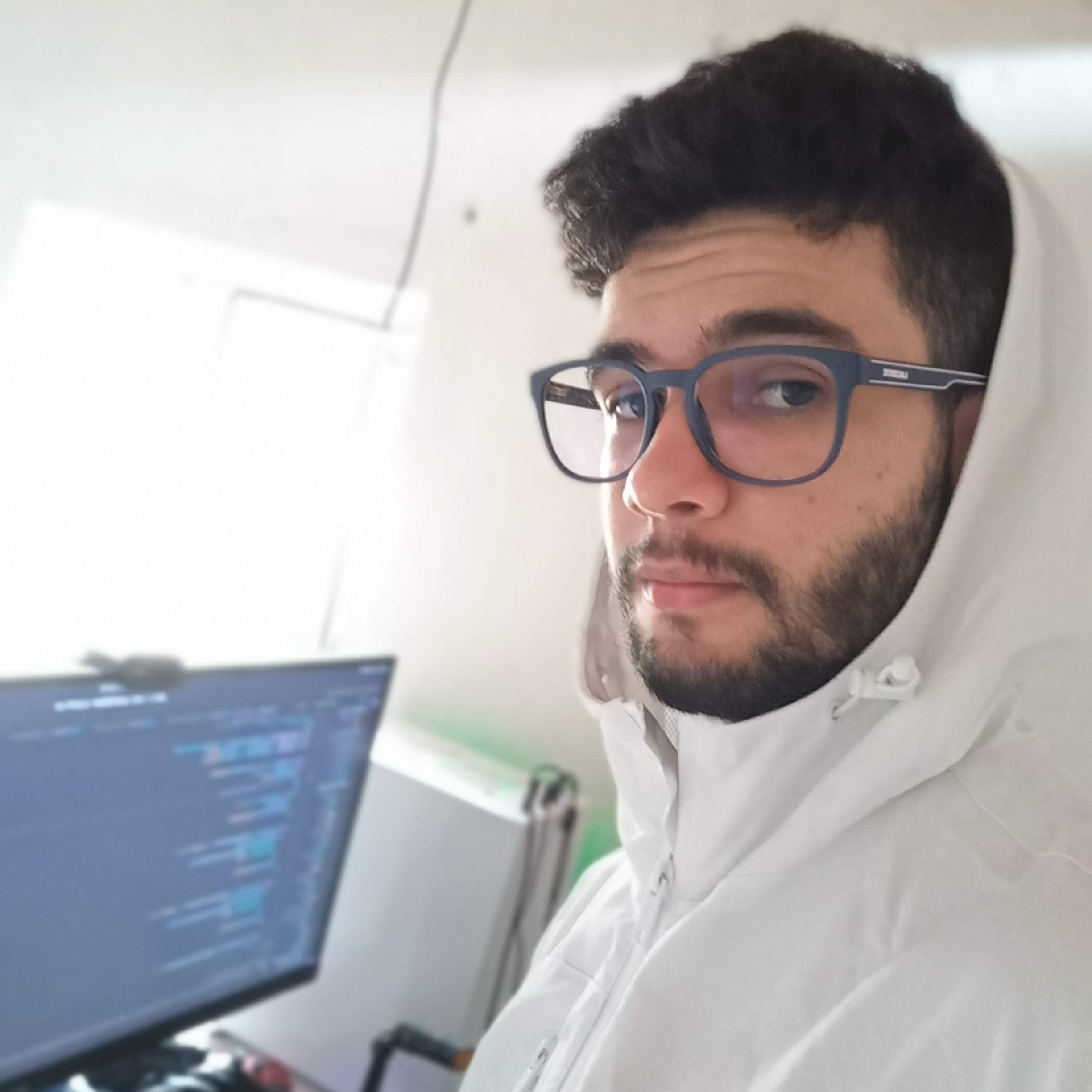 A selfie of me in front of a computer
